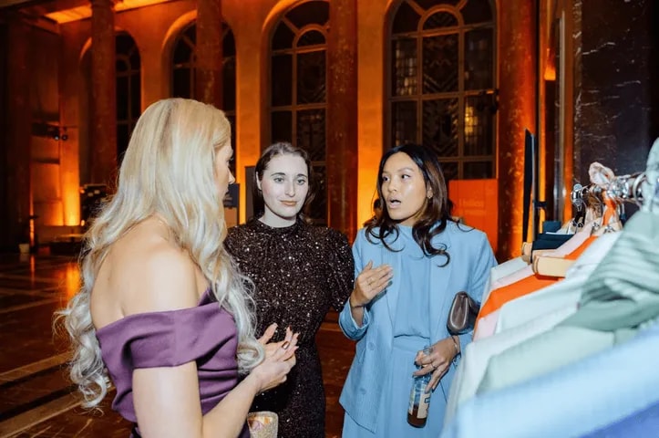Three guests laughing together