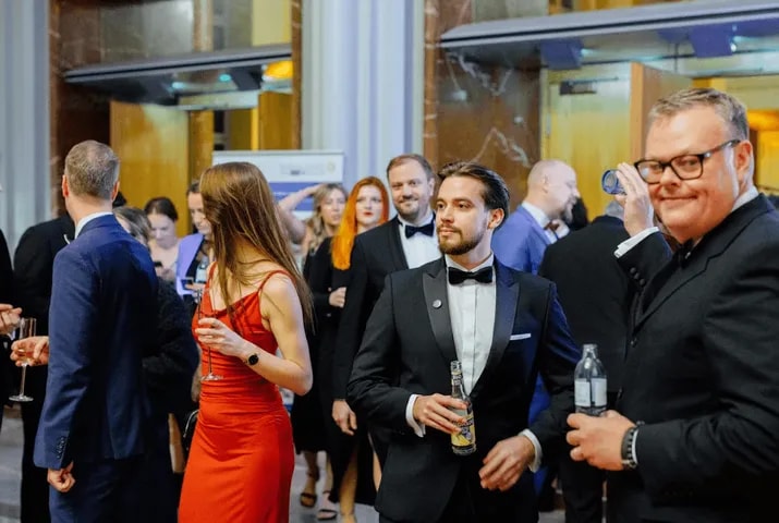 A full hall of guests networking at the Gala